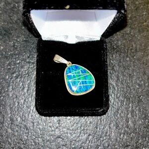 Sterling silver and opal pendant